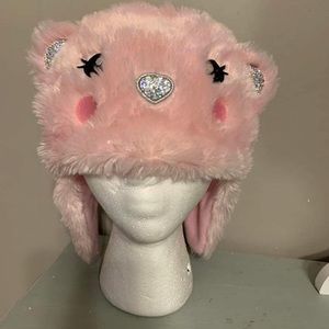 Pink furry hat with ear flaps
